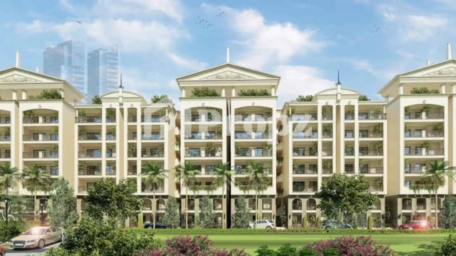 Front facade of ATCO La Vivant Villaments with classical architecture, balconies, and landscaped lawn in Sarjapur