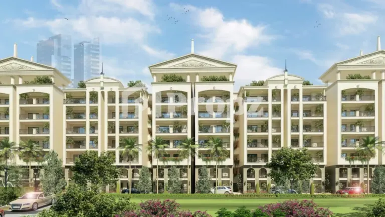 Side view of ATCO La Vivant Villaments showing multi-story residential buildings with palm trees and green lawns
