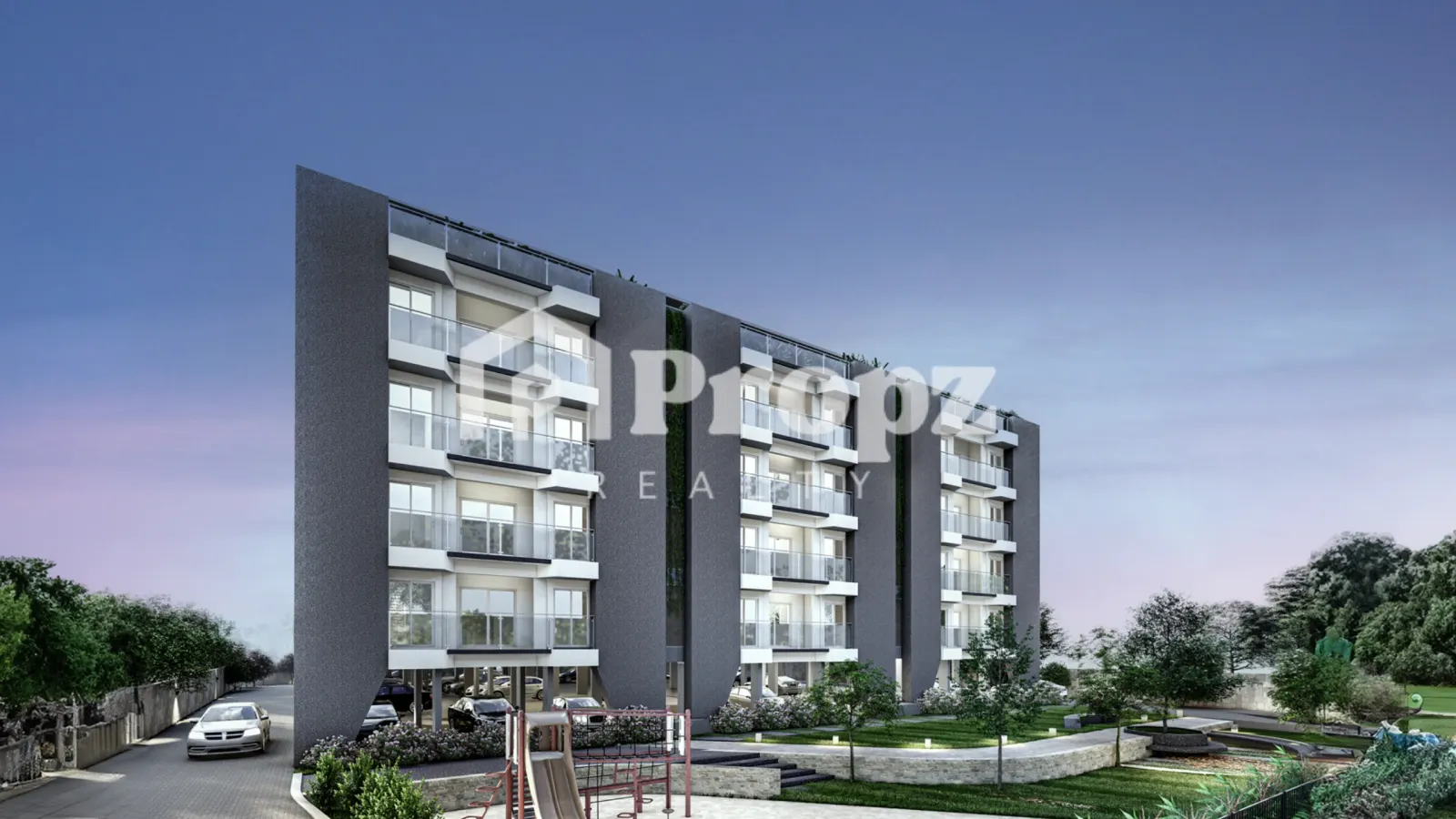 Modern residential building facade with gray and white exterior, balconies, and landscaped entrance at Windmere