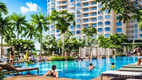 Swimming pool area with palm trees and lounge chairs at Bhartiya Nikoo Homes 8 residential complex