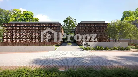 Two residential buildings with decorative terracotta screen facades and central entrance pathway