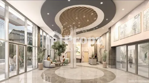 Modern lobby interior with decorative ceiling, seating area, and reception desk