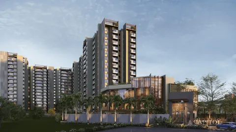 Exterior view of Sumadhura Capitol Residences high-rise towers with glass clubhouse and palm tree landscaping