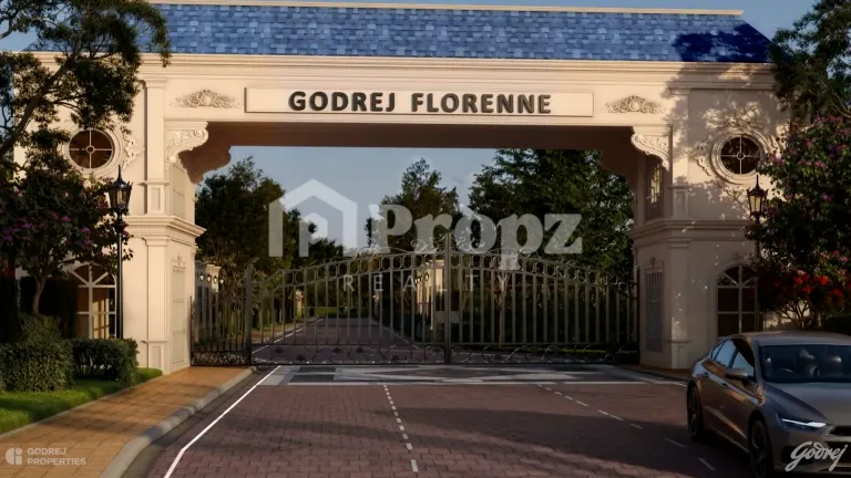 Godrej Florenne entrance gate with ornate ironwork and project name signage on cream archway