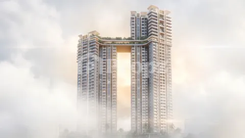 Front elevation of The Rise twin residential towers with connecting sky bridge and rooftop greenery in mist