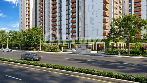 Street view of Assetz Soho & Sky entrance gate with modern facade and orange balconies