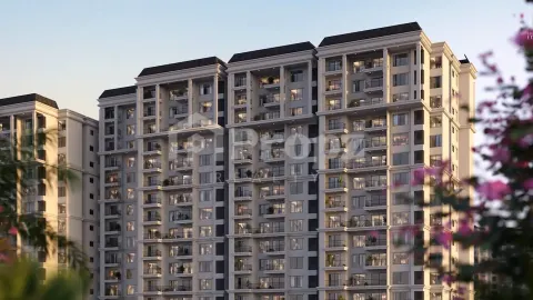 Close-up facade view of residential tower with balconies and classical architectural details at Sumadhura Edition Phase 2