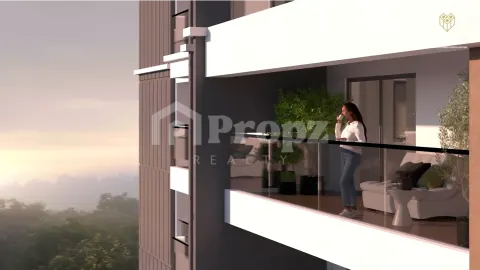 Modern balcony with glass railing overlooking green landscape at Amberstone Ventara Residences