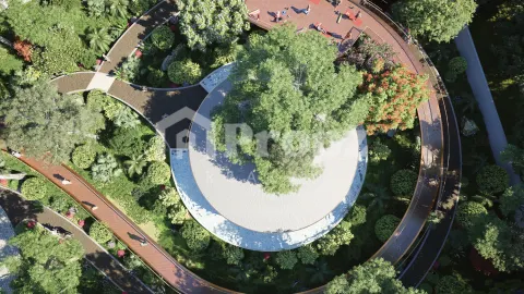 Aerial view of circular landscaped garden with water feature and walking paths at Amberstone Vectra