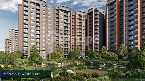Residential towers with landscaped water feature and greenery at TVS Emerald Altura