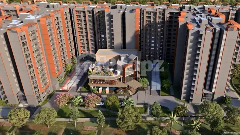 Aerial view of central clubhouse surrounded by residential towers with landscaped gardens